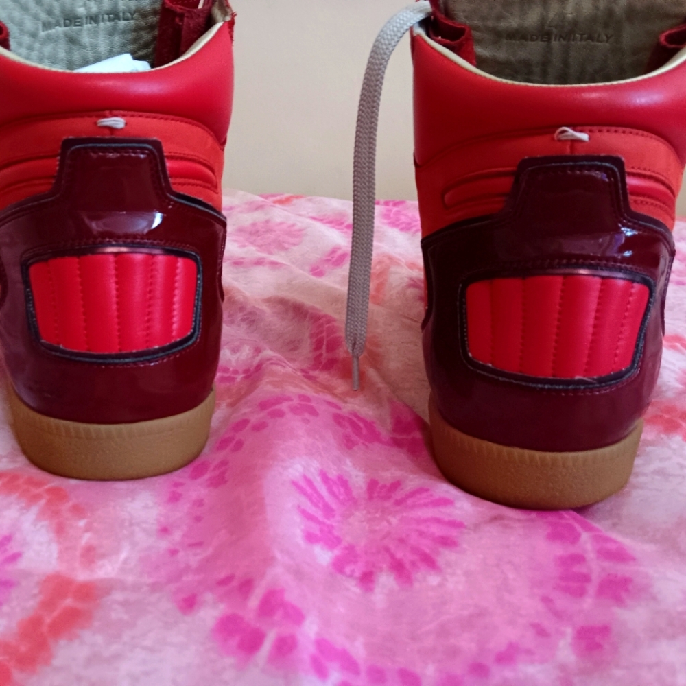 Size 13(46) Red & Maroon high tops with a tan sole and white laces.